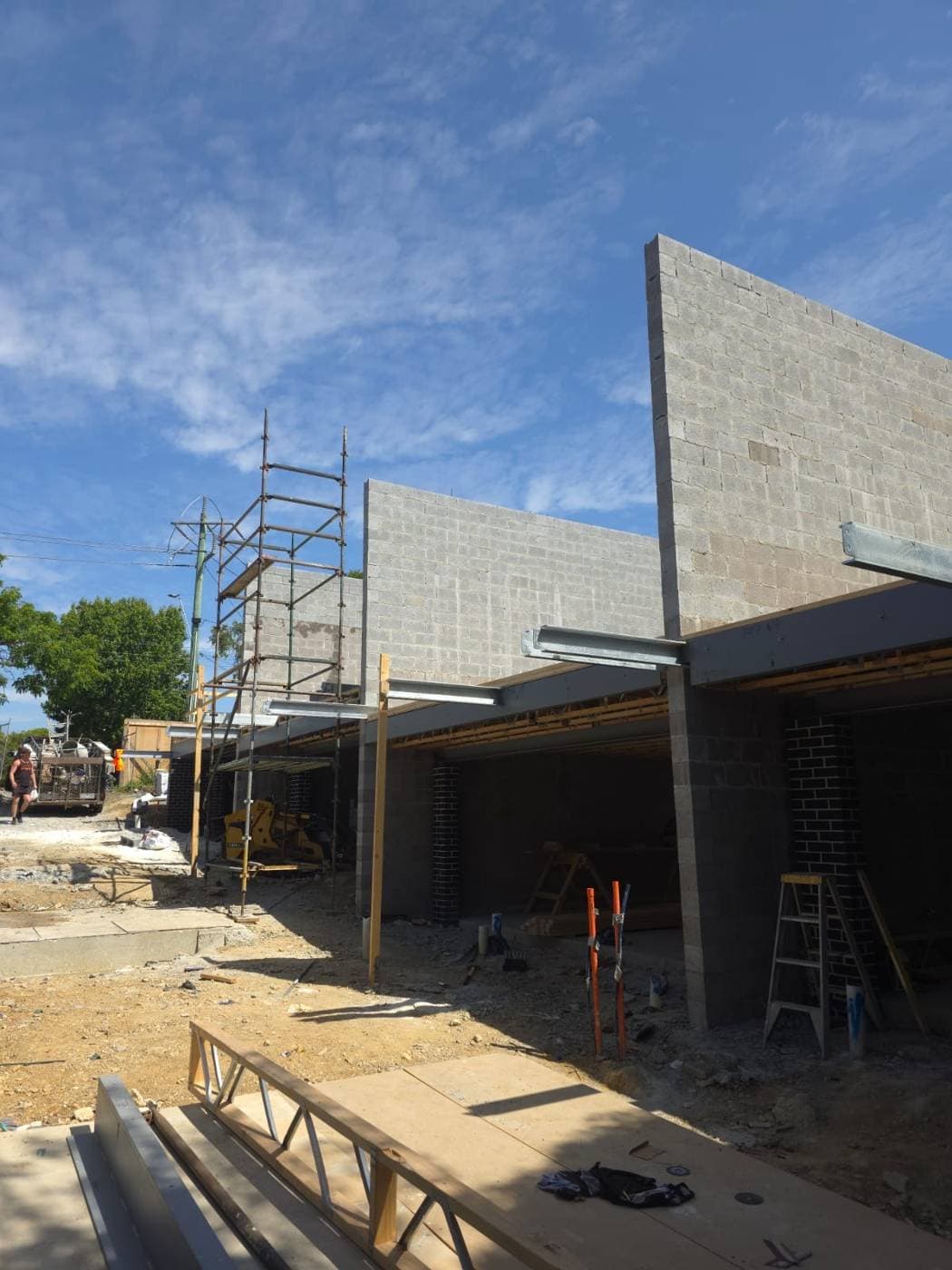 Structural block wall with steel lintels and scaffolding, structural blockwork, Melbourne