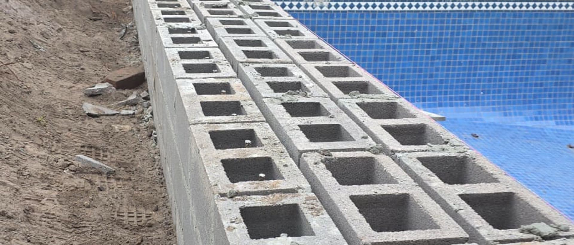 block retaining wall melbourne — concrete core fill steel reinforced wall eastern suburbs