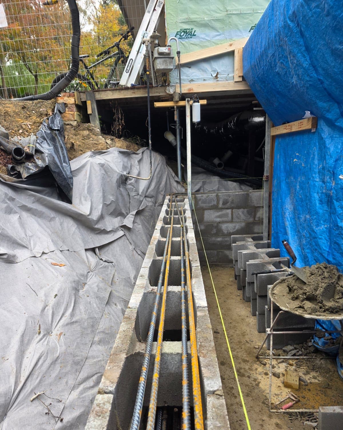 steel-reinforced concrete block dividing wall — JC Brick & Blocklaying — bricklayer Melbourne eastern suburbs