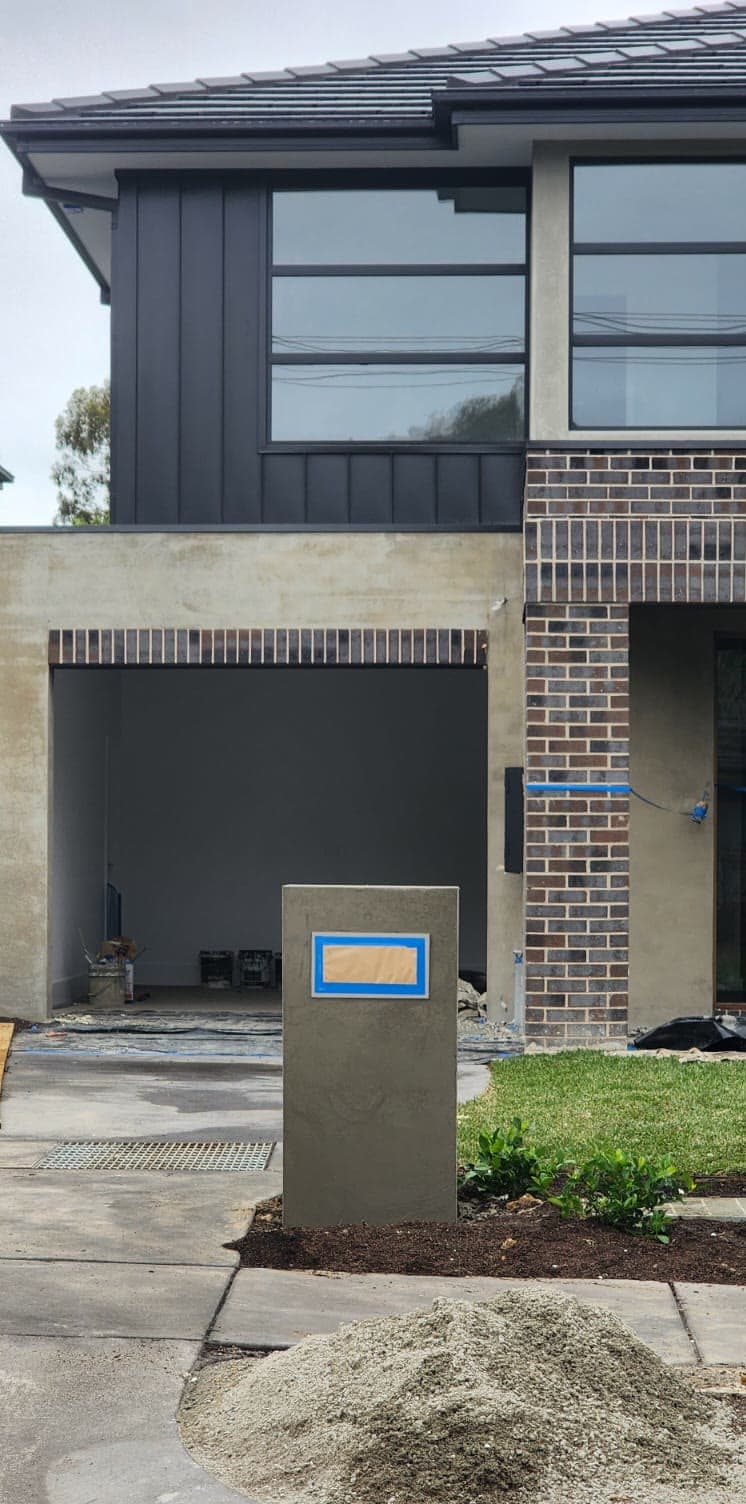 feature wall and front fence melbourne — sandstone garden wall jc brick and blocklaying